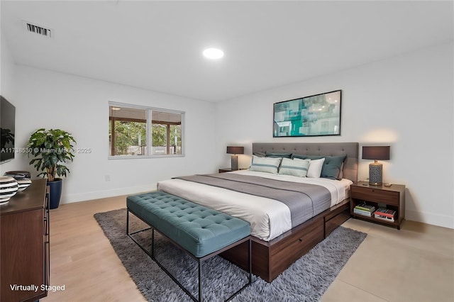 bedroom featuring light wood-type flooring