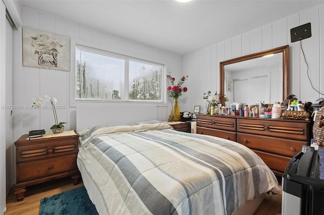 bedroom with light hardwood / wood-style floors