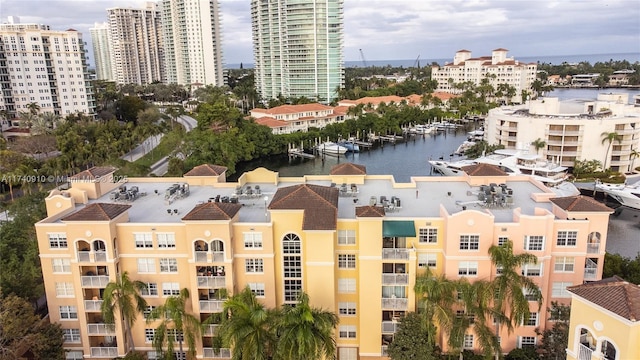 bird's eye view with a water view and a city view