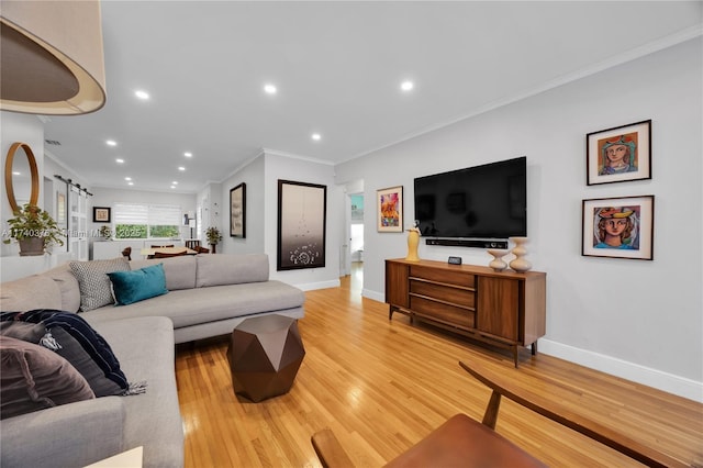 1249 Venetia Ave, Coral Gables, FL 33134 - living room featuring a barn door, crown molding, and wood-type flooring