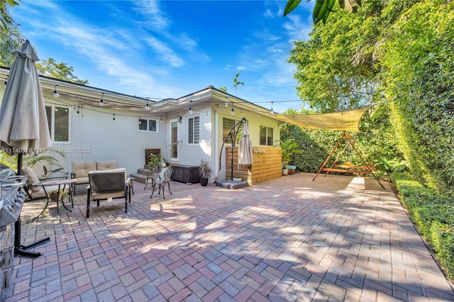 exterior space featuring an outdoor hangout area