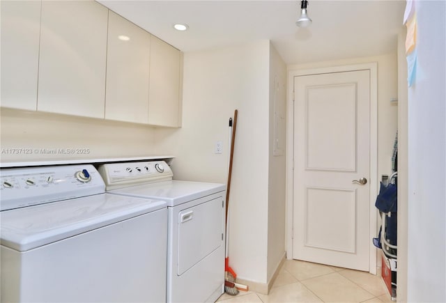 4000 Island Blvd Unit 2402, Aventura, FL 33160 - laundry room featuring cabinets, washing machine and dryer, and light tile patterned floors
