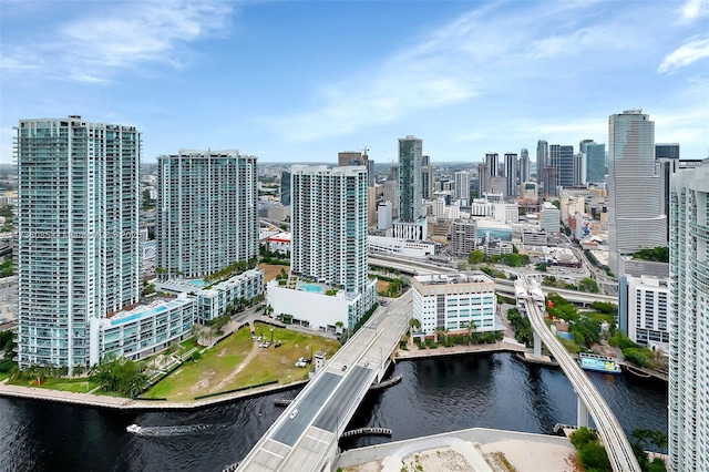 property's view of city with a water view