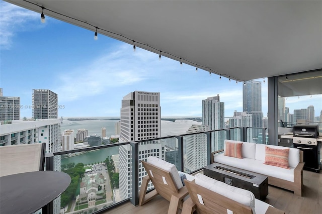 68 SE 6th St Unit 3911, Miami, FL 33131 - balcony featuring a water view and a grill