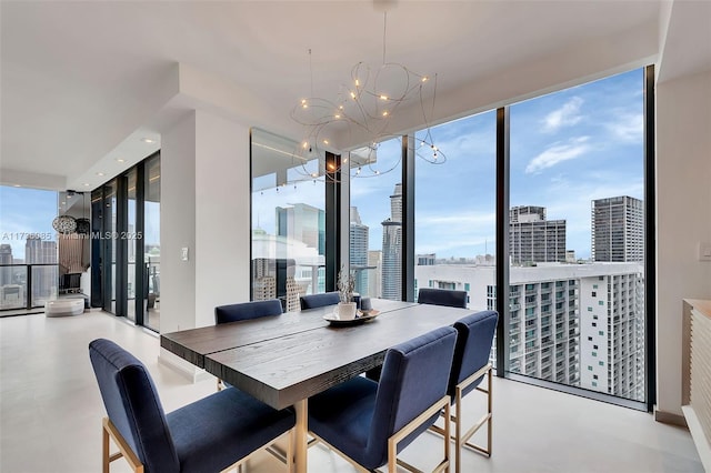 68 SE 6th St Unit 3911, Miami, FL 33131 - dining room featuring floor to ceiling windows and a chandelier