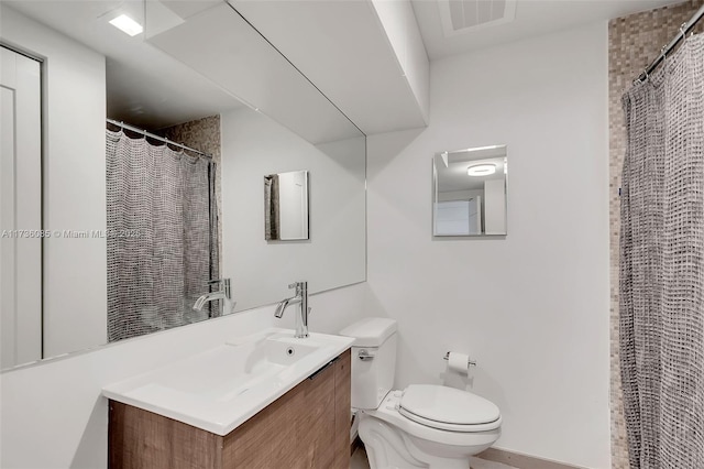 68 SE 6th St Unit 3911, Miami, FL 33131 - bathroom with vanity and toilet
