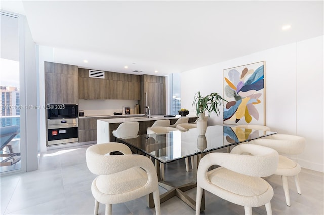 dining area featuring sink