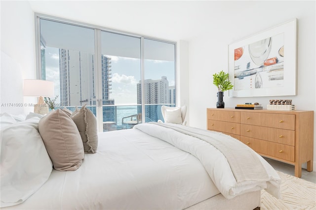 17550 Collins Ave Unit 1501, Sunny Isles Beach, FL 33160 - bedroom with access to exterior, a view of city, and floor to ceiling windows