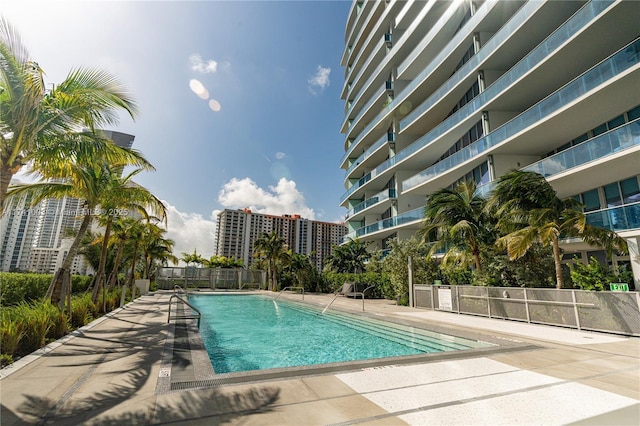 view of pool featuring a patio area