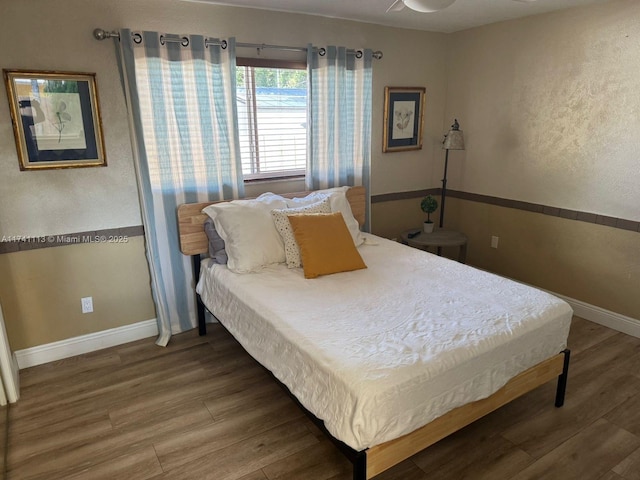 bedroom featuring hardwood / wood-style floors