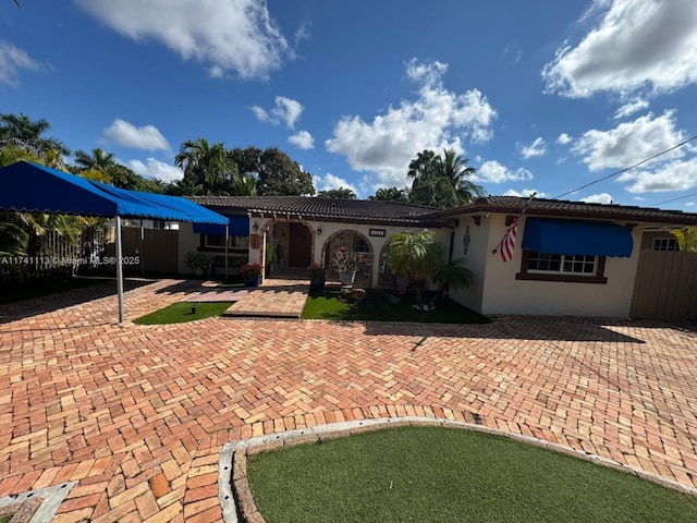 view of front of home with a patio area