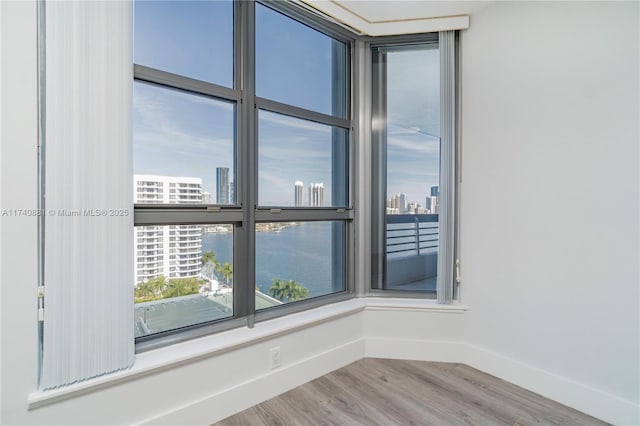 3530 Mystic Pointe Dr Unit 1513, Aventura, FL 33180 - spare room featuring hardwood / wood-style floors
