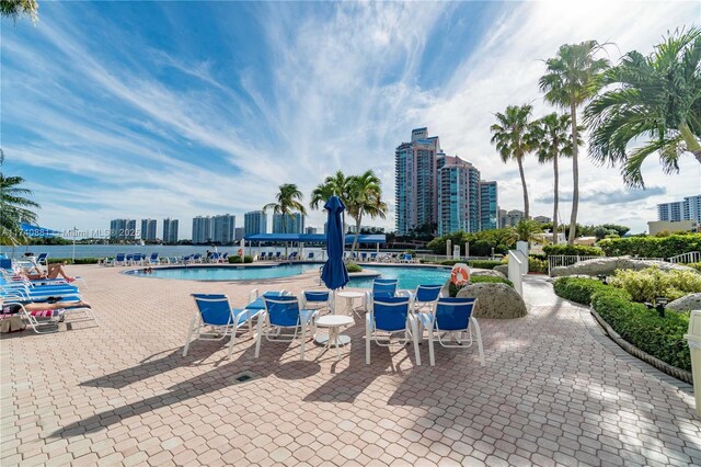 3530 Mystic Pointe Dr Unit 1513, Aventura, FL 33180 - view of pool featuring a patio area