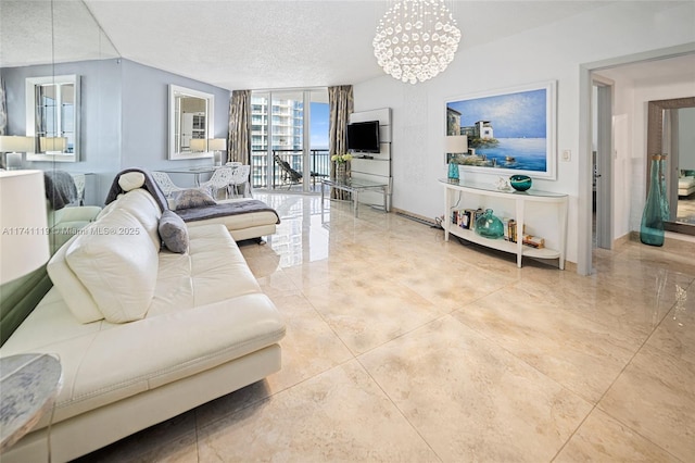 living room featuring floor to ceiling windows, a notable chandelier, and a textured ceiling