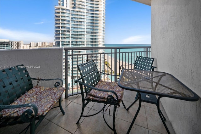 balcony featuring a water view