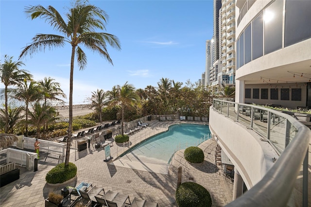 view of swimming pool featuring a patio