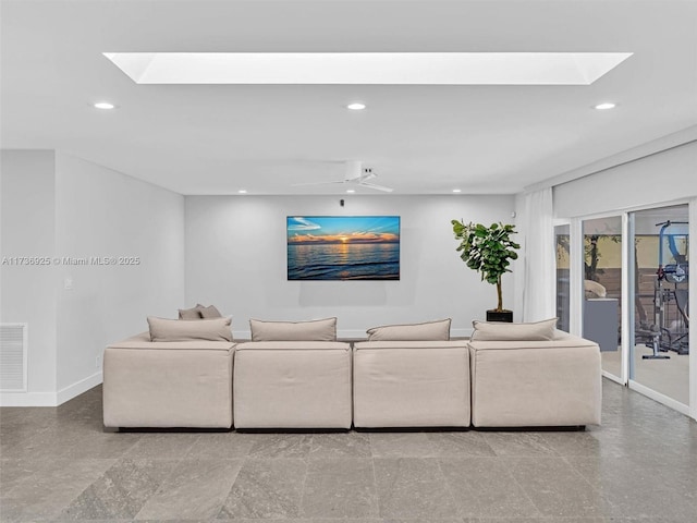 living room with a skylight