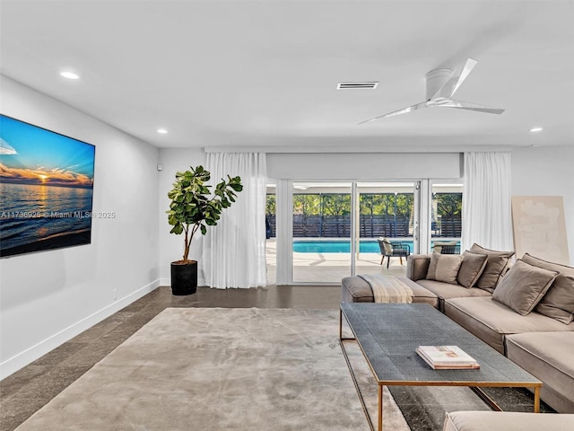 living room with ceiling fan