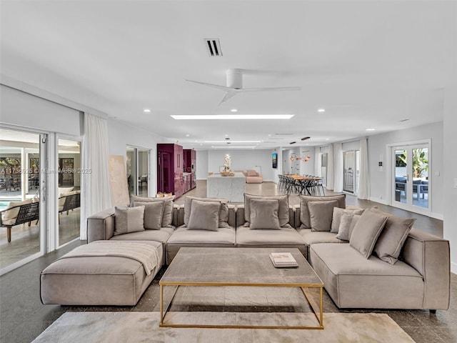 living room with ceiling fan