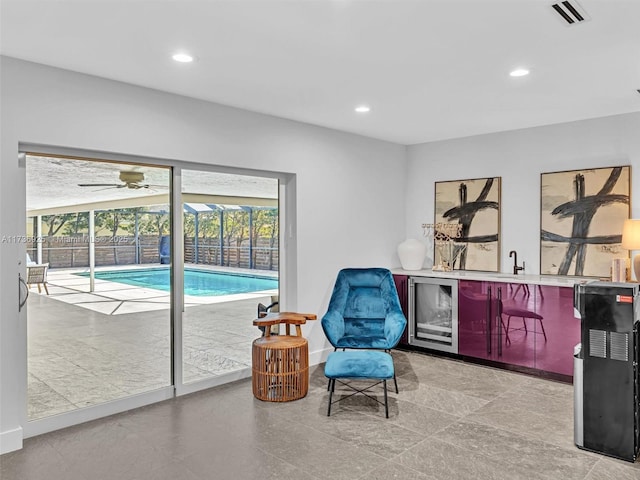 living area featuring wine cooler