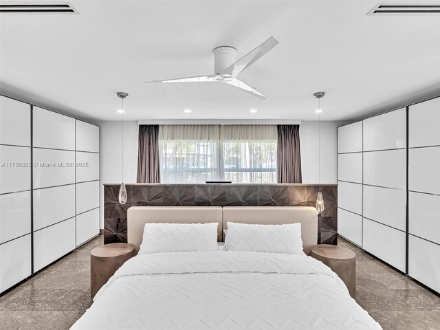 bedroom featuring concrete floors and ceiling fan