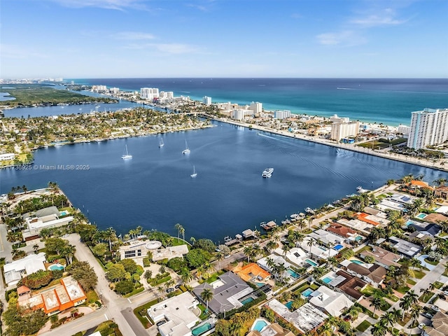 bird's eye view with a water view