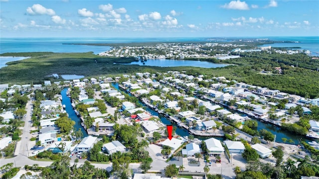 aerial view featuring a water view and a residential view