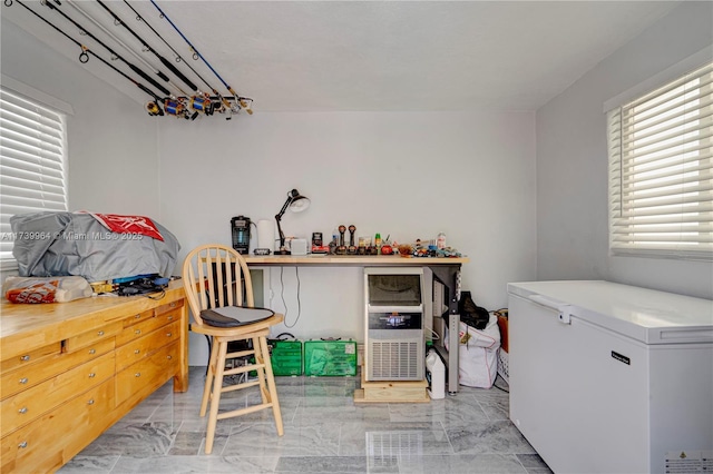 interior space featuring marble finish floor and visible vents