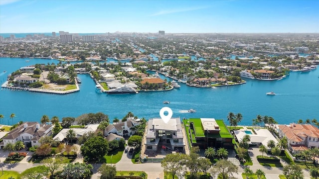 birds eye view of property featuring a water view