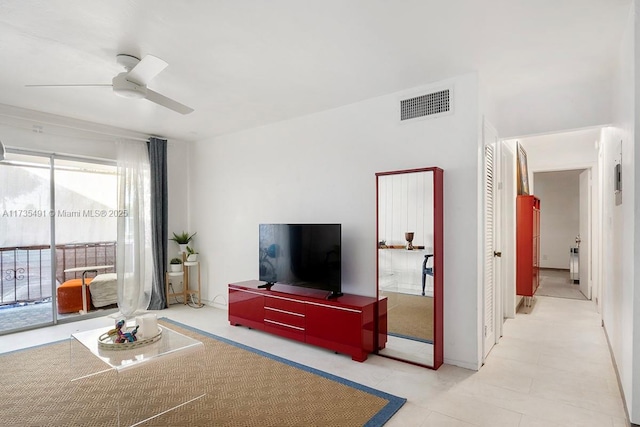 living room featuring ceiling fan