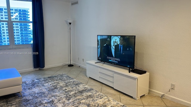 living room featuring light tile patterned flooring