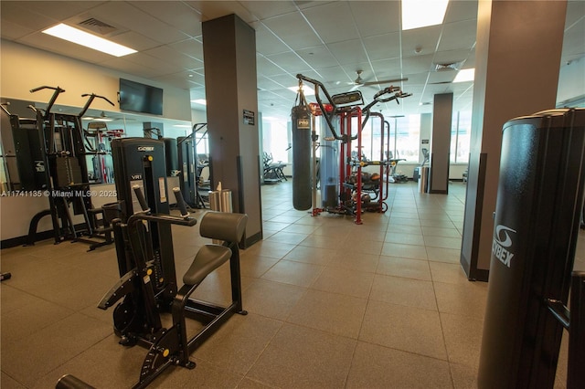 gym with a drop ceiling