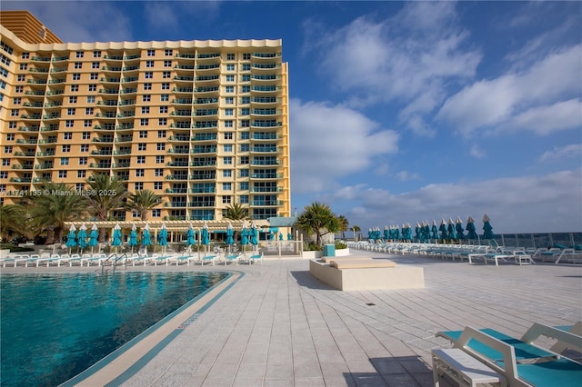 view of swimming pool with a patio area