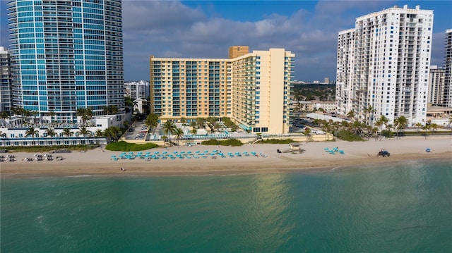 drone / aerial view with a view of the beach and a water view