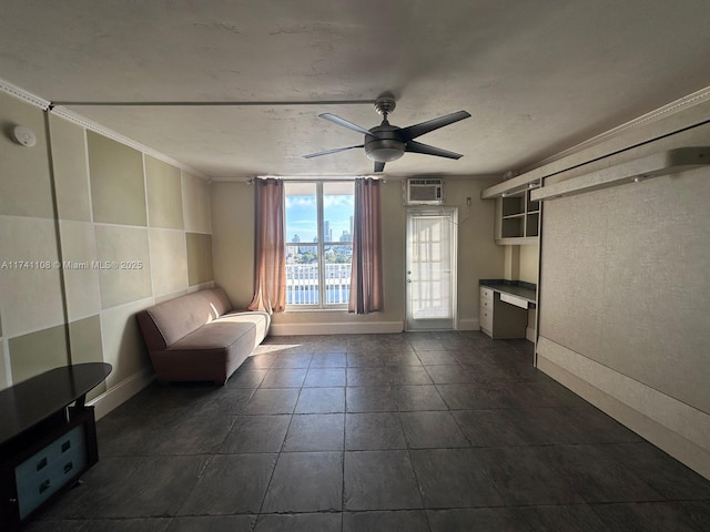 unfurnished room with crown molding, an AC wall unit, and ceiling fan