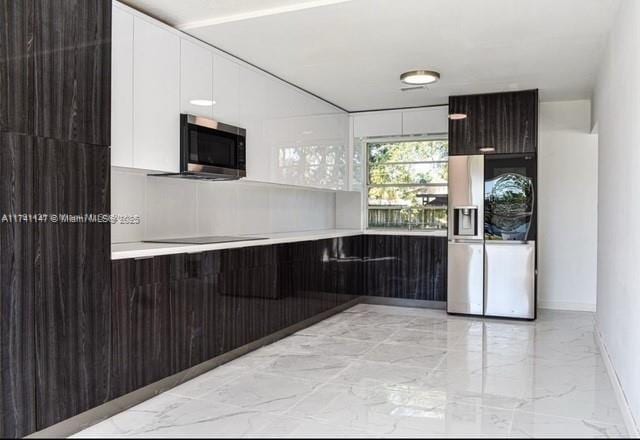 kitchen with stainless steel appliances and kitchen peninsula