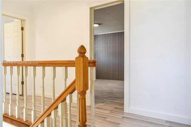 staircase featuring hardwood / wood-style flooring