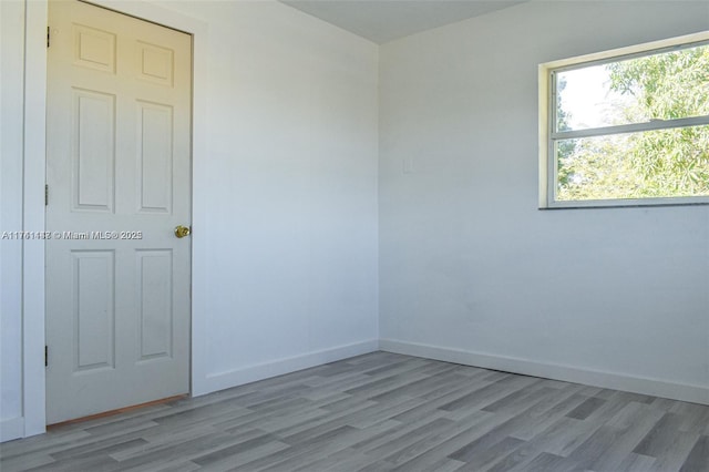 empty room with light wood-type flooring