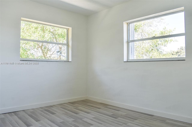 empty room featuring light hardwood / wood-style floors