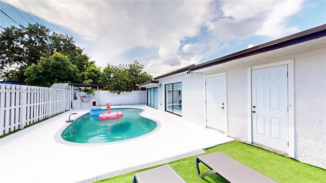 view of pool with a patio