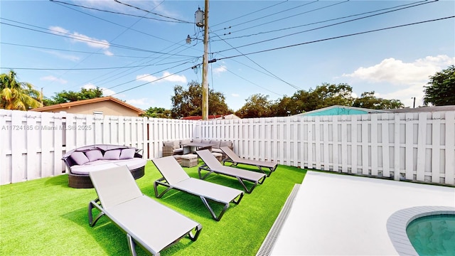 view of yard with outdoor lounge area