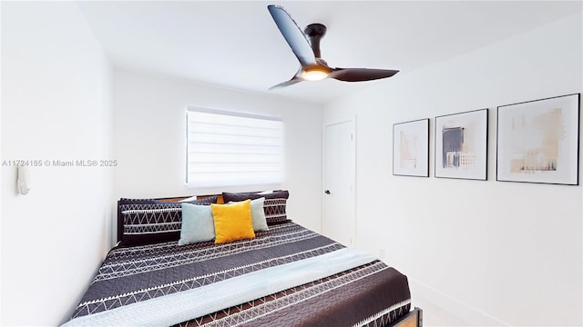 unfurnished bedroom featuring ceiling fan