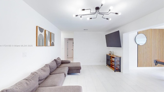 living room featuring a chandelier