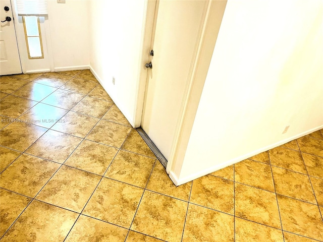 interior space with tile patterned floors