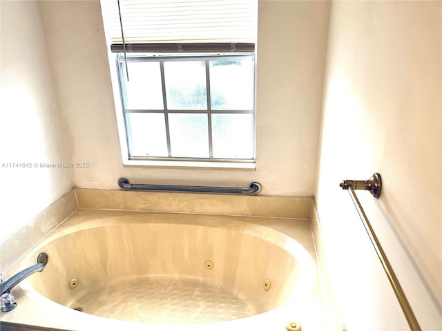 bathroom with a washtub