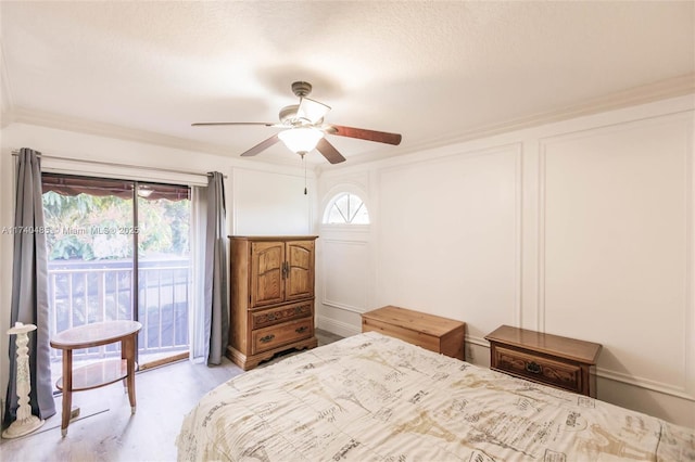 bedroom with multiple windows, ornamental molding, access to outside, and ceiling fan