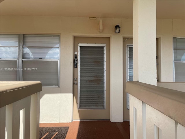 doorway to property with a balcony