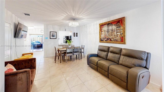 living room with light tile patterned floors