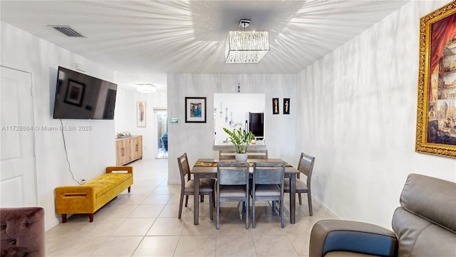 dining space with light tile patterned flooring