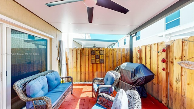 view of patio with a grill and ceiling fan